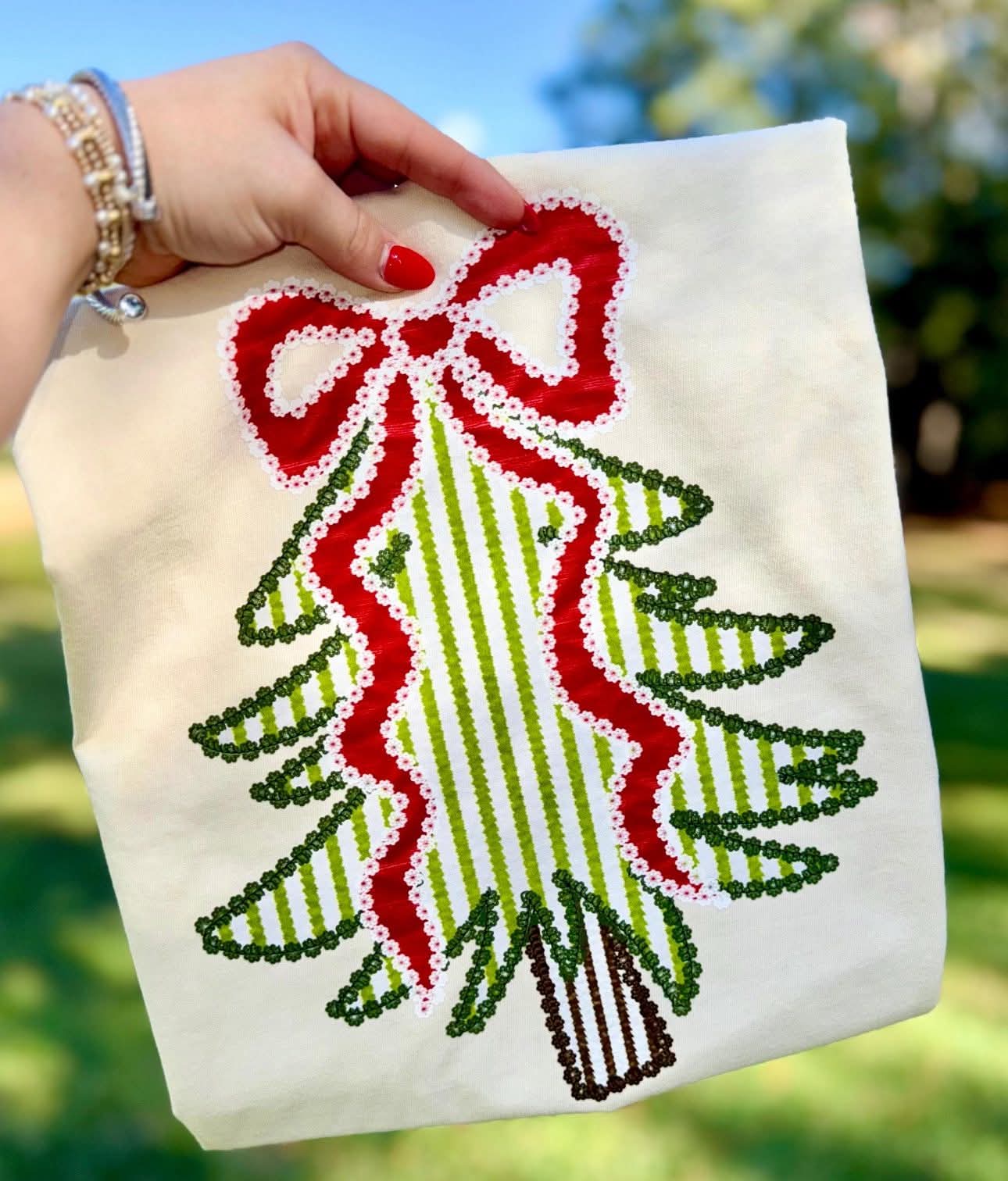 Tree and bow- tee or crewneck